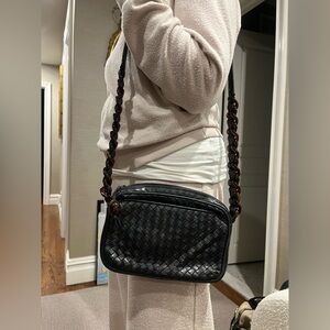 Black leather woven bag